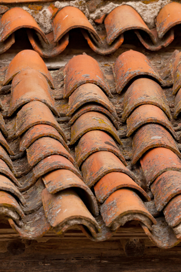 A photo of tile roofing system that requires attention.